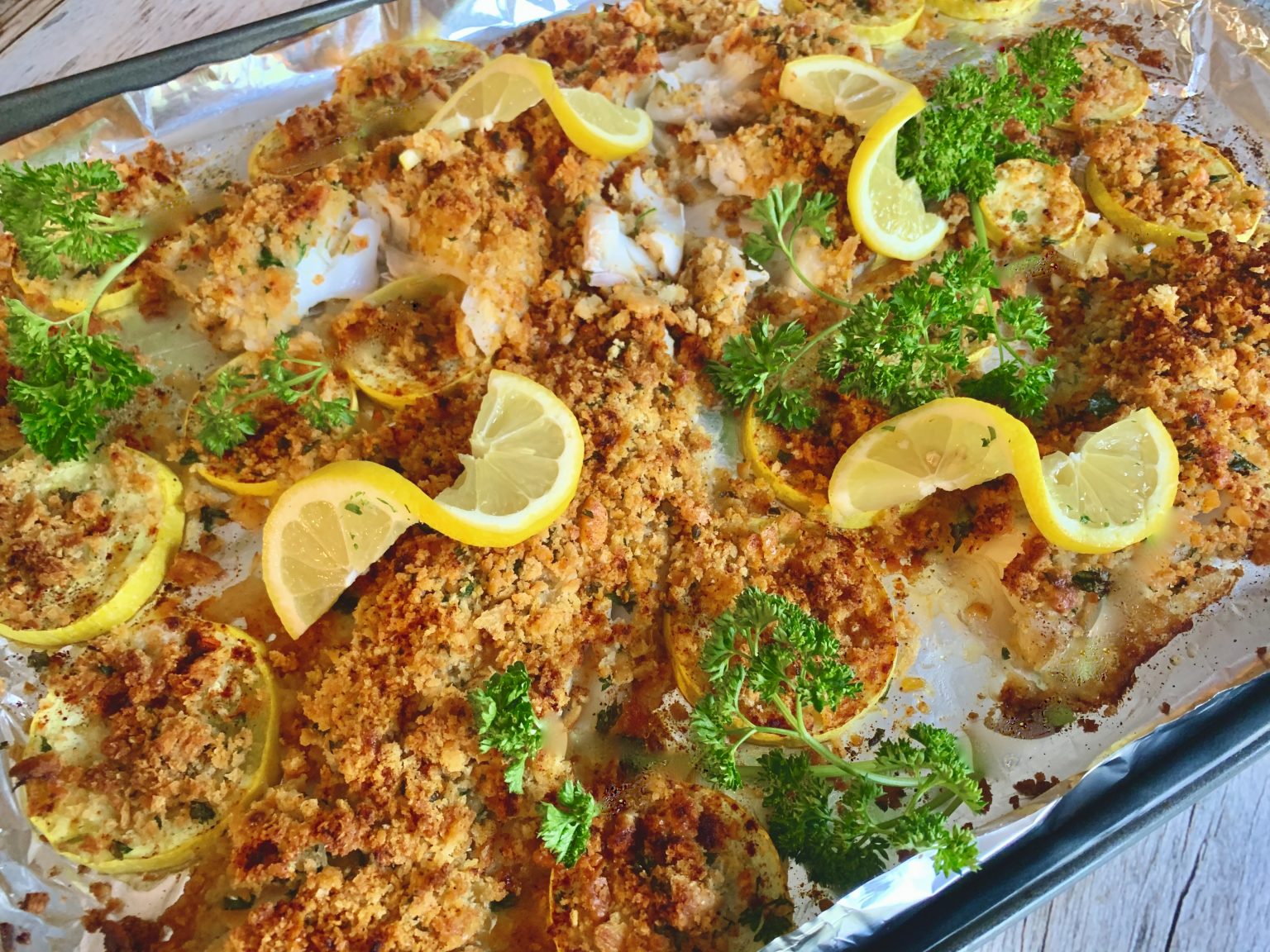 SHEET PAN HADDOCK AND SUMMER SQUASH WITH PARMESAN PARSLEY CRUMBS Dish
