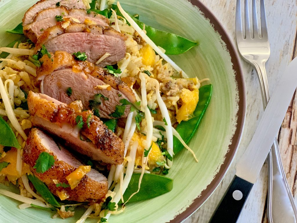 Ginger Apricot Glazed Duck Breasts Over Mango Fried Rice