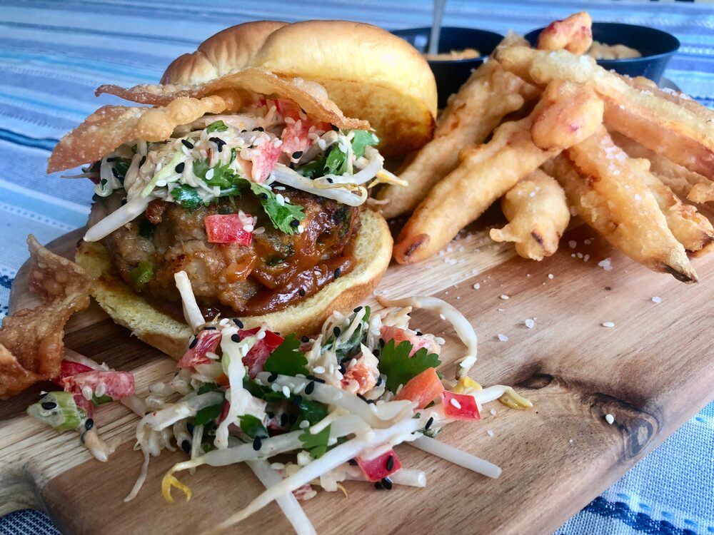WONTON BURGERS WITH MAGIC PEANUT SAUCE, SPICY ASIAN SLAW, FRIED WONTON CRUNCH AND TEMPURA SWEET POTATO AND RED PEPPER FRIES WITH TWO DIPPING SAUCES Beyond Burger and Fries...