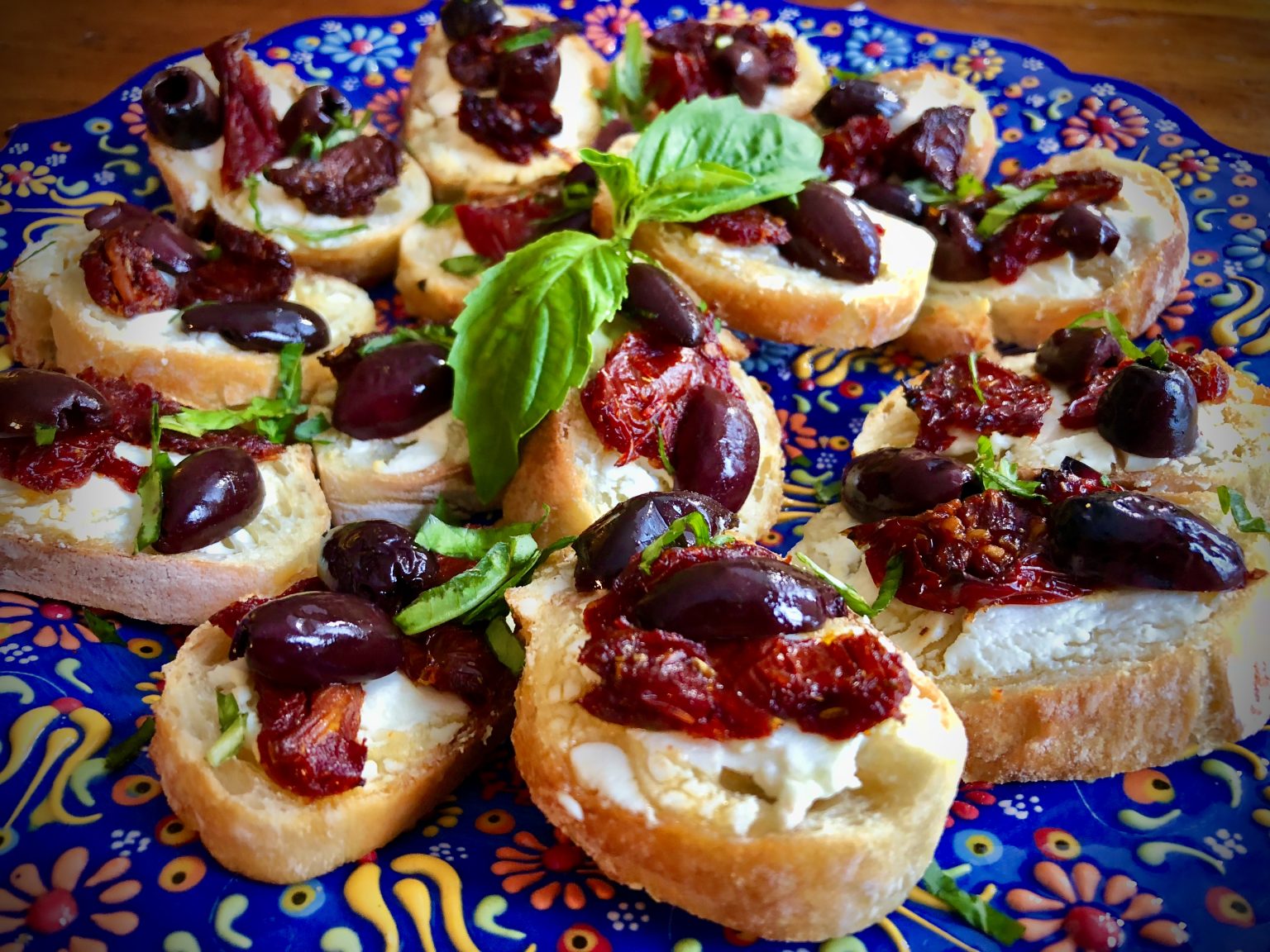 GOAT CHEESE CROSTINI WITH KALAMATA OLIVES AND SUN DRIED TOMATOES Dish off the Block