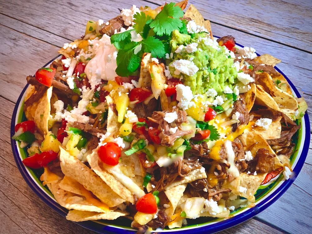 A Perfect Plethora Of Pulled Pork Pleasers Asian Pulled Pork Nachos With Pineapple Salsa