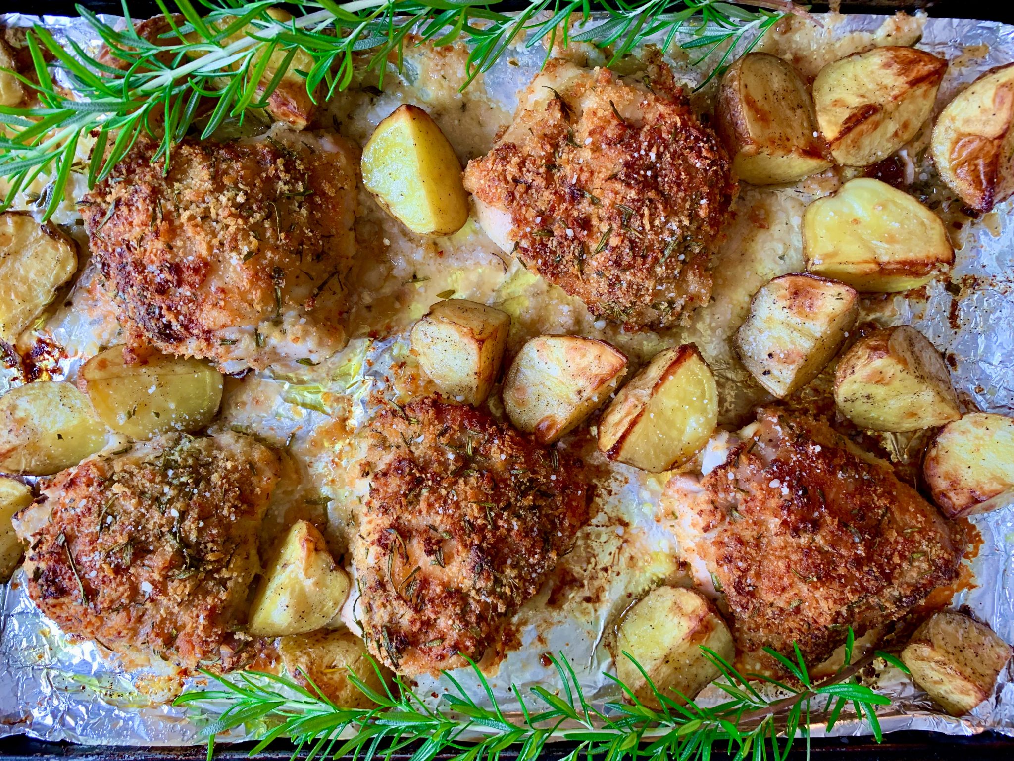 BAKED PARMESAN, ROSEMARY, AND PANKO CRUSTED CHICKEN THIGHS Dish off
