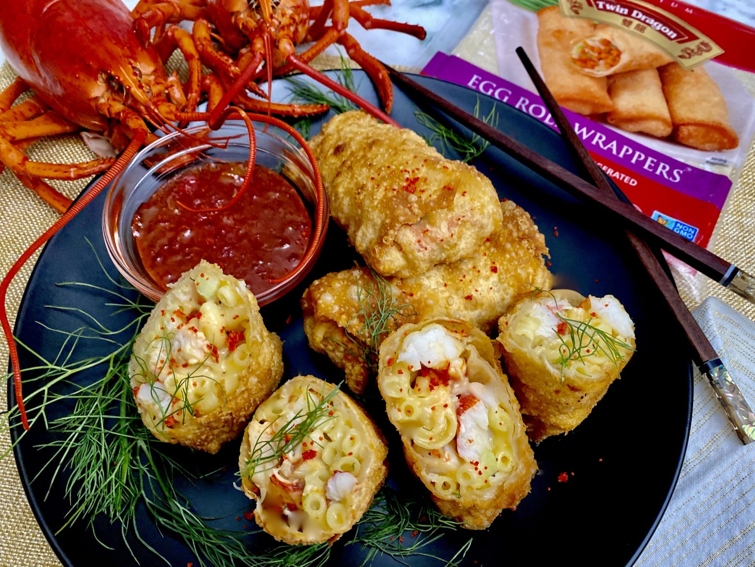 LOBSTER MAC AND CHEESE EGG ROLLS WITH APRICOT SRIRACHA DIPPING SAUCE