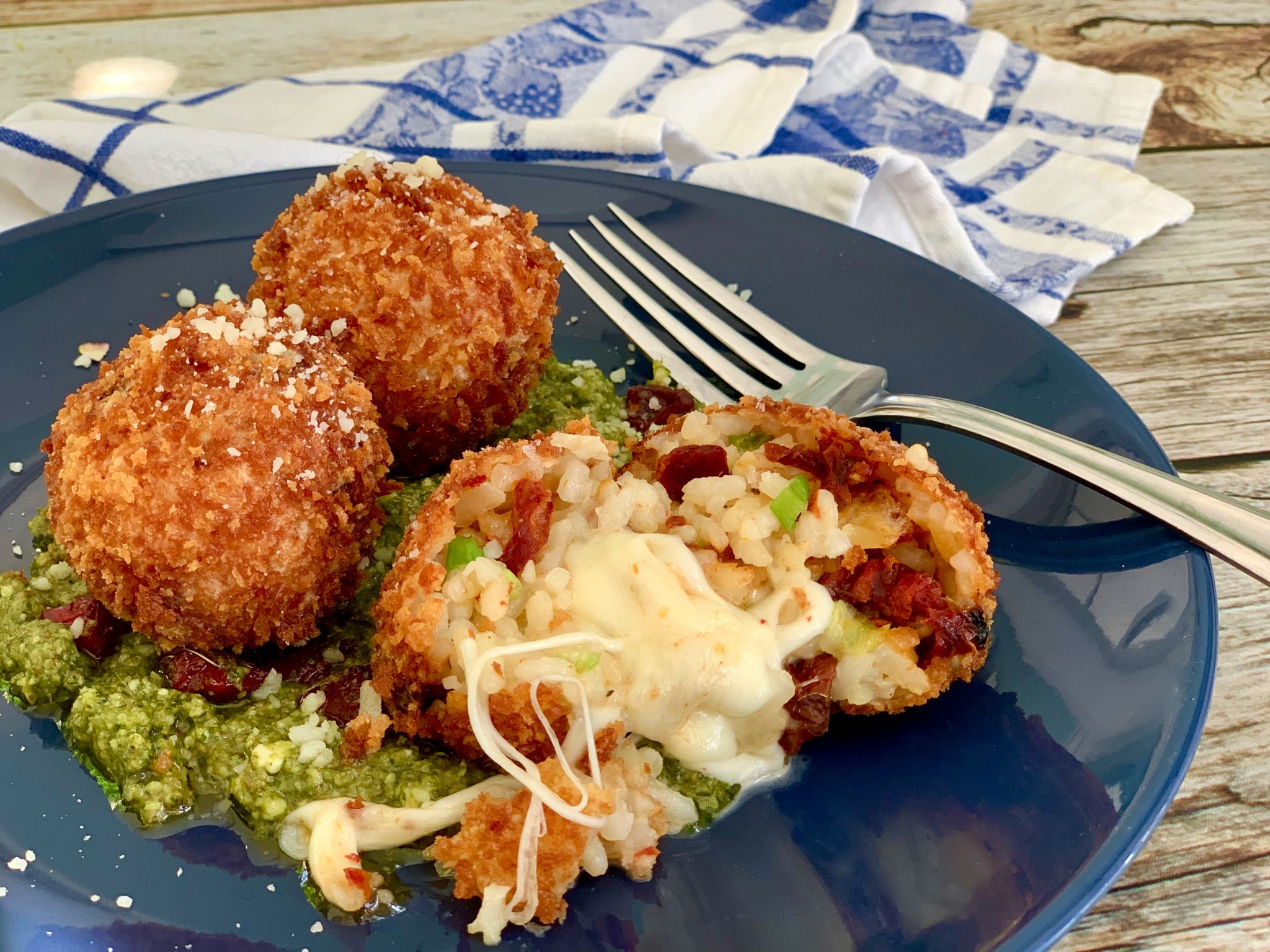 SUN DRIED TOMATO ARANCINI OVER PESTO Dish off the Block
