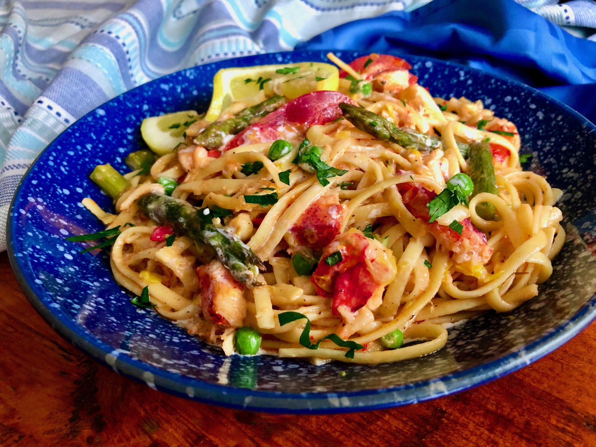 LOBSTER PASTA WITH ASPARAGUS AND PEAS IN SHERRY CREAM SAUCE Dish off the Block