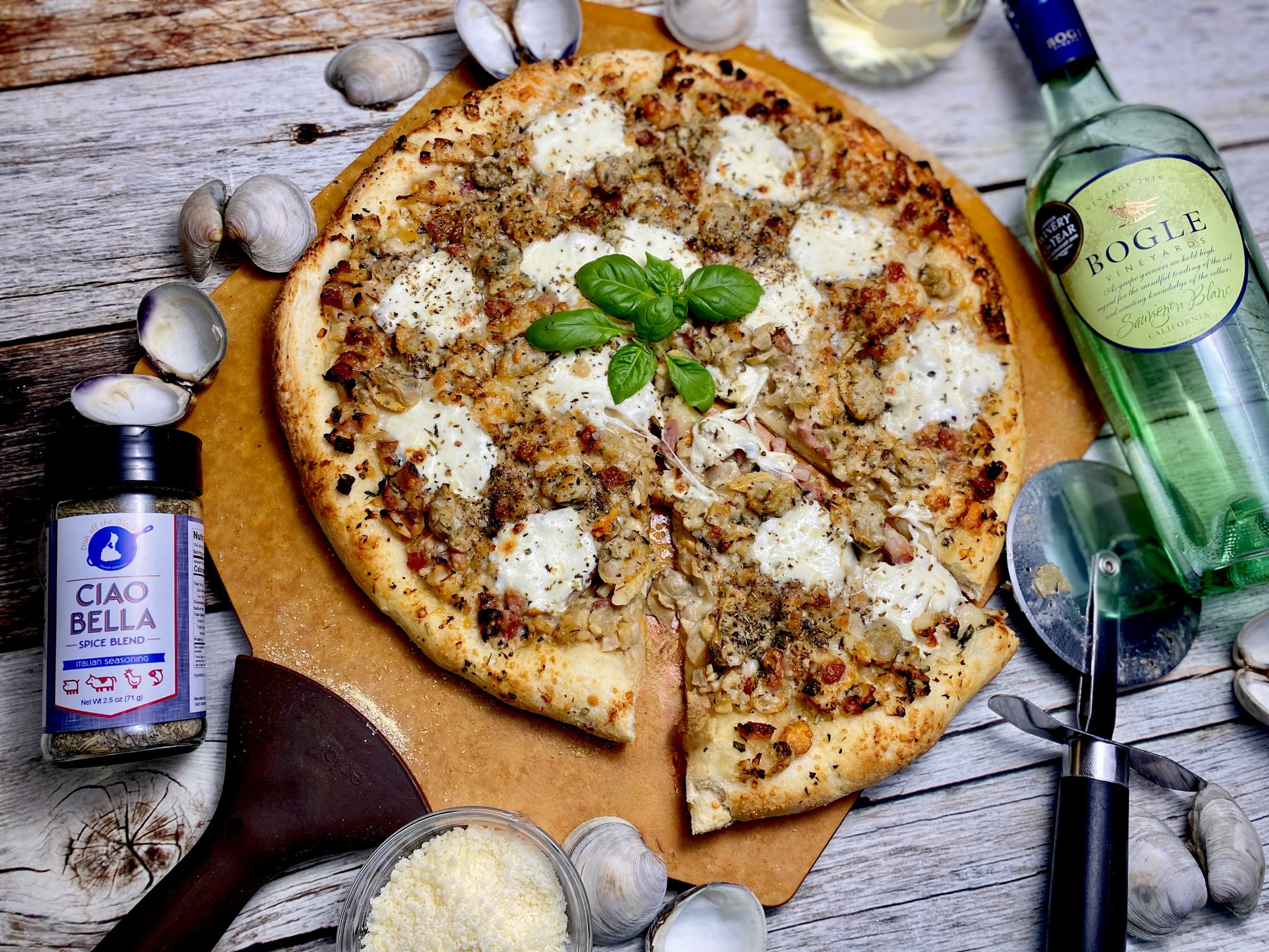 WHITE CLAM PIZZA WITH PARMESAN AND FRESH MOZZARELLA Dish off the Block