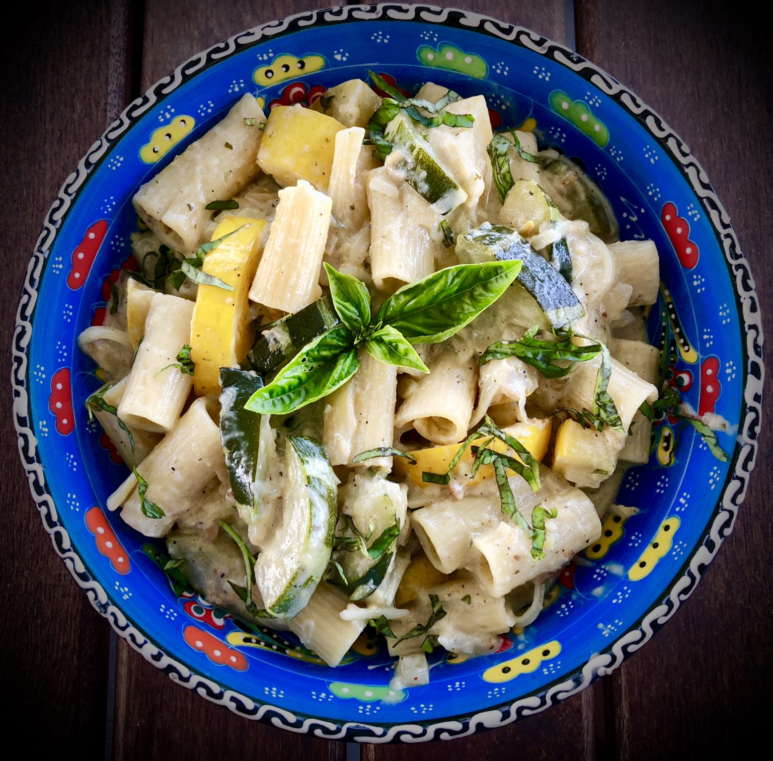 RIGATONI WITH SUMMER SQUASH MEDLY IN A PESTO ALFREDO CREAM SAUCE Dish