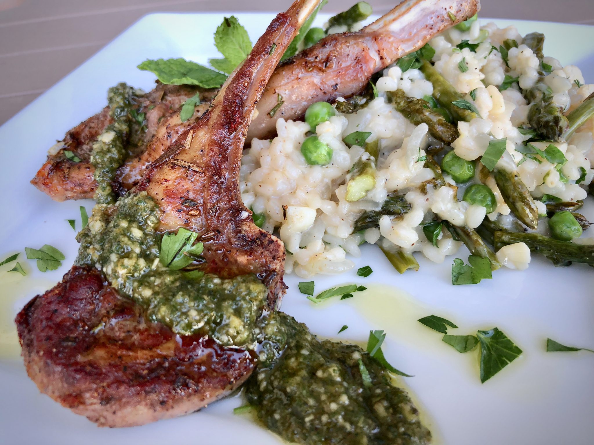GRILLED BABY LAMB CHOPS WITH MINT PESTO OVER SPRING RISOTTO WITH