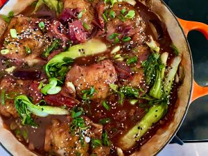 Sweet And Spicy Korean Chicken Thighs With Plums, Onions, And Bok Choy