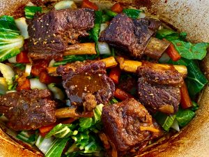 BRAISED KOREAN SHORT RIBS WITH PICKLED ONION, CUCUMBER, AND JALAPENO TOPPER