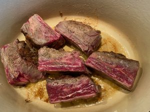 BRAISED KOREAN SHORT RIBS WITH PICKLED ONION, CUCUMBER, AND JALAPENO TOPPER