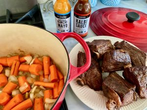 BRAISED KOREAN SHORT RIBS WITH PICKLED ONION, CUCUMBER, AND JALAPENO TOPPER