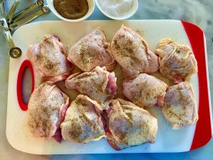 SWEET AND SPICY KOREAN CHICKEN THIGHS WITH PLUMS, ONIONS, AND BOK CHOY
