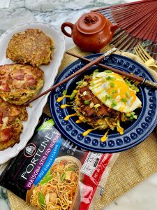 BACON AND NOODLE OKONOMIYAKI PANCAKES WITH SUNNY SIDE EGGS AND SRIRACHA MAYO
