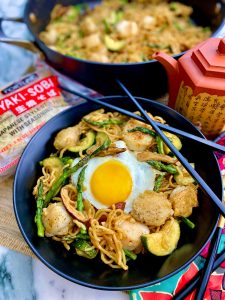 SCALLOP AND SPRING VEGETABLE NOODLE STIR FRY WITH SUNNY SIDE TOPPER