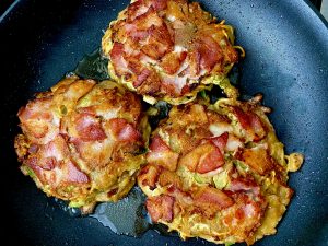BACON AND NOODLE OKONOMIYAKI PANCAKES WITH SUNNY SIDE EGGS AND SRIRACHA MAYO