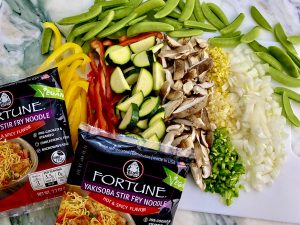 TURN UP THE HEAT RAINBOW VEGGIE AND LOBSTER CURRY YAKISOBA STIR-FRY