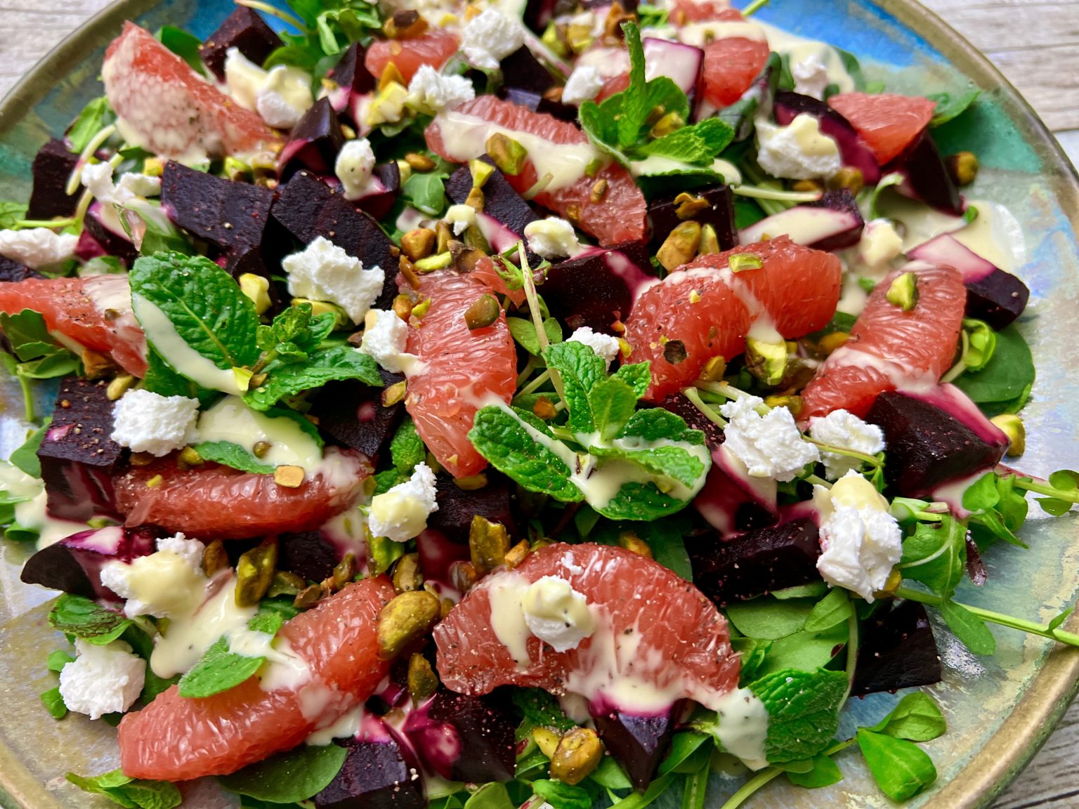 BEET AND GRAPEFRUIT SALAD WITH MINT, PISTACHIOS, GOAT CHEESE, AND