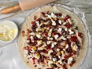 Rustic Chicken, Bacon, Date, And Goat Cheese Tart With Maple Cream