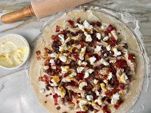 RUSTIC CHICKEN, BACON, DATE, AND GOAT CHEESE TART WITH MAPLE CREAM