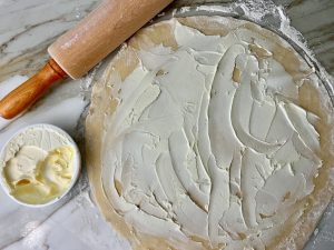 RUSTIC CHICKEN, BACON, DATE, AND GOAT CHEESE TART WITH MAPLE CREAM