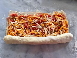 CHEESY SALSA PINWHEEL PUFFS