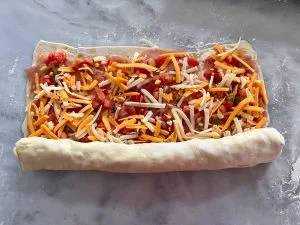 CHEESY SALSA PINWHEEL PUFFS