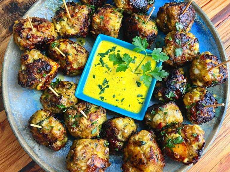 INDIAINSPIRED MEATBALLS WITH PINE NUTS, RAISINS, AND FETA WITH HERBY