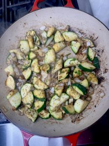 Easy One Pan Italian Chicken Thighs With Zucchini, Artichoke Hearts, And Orzo