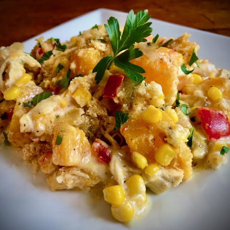 BAKED FLOUNDER WITH WILD RICE, LEEK, AND MUSHROOM STUFFING AND LEMON CHIVE BEURRE BLANC Dish